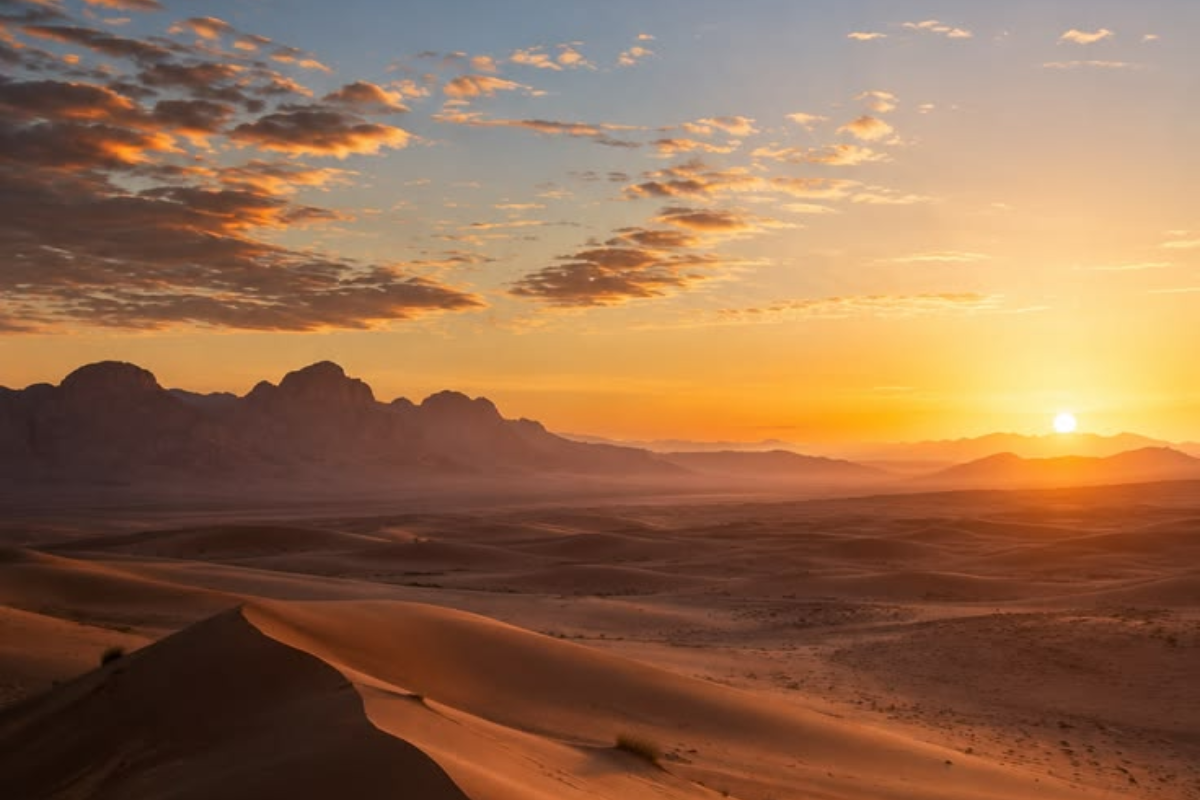 Sahara desert dunes golden pink orange sunset photography