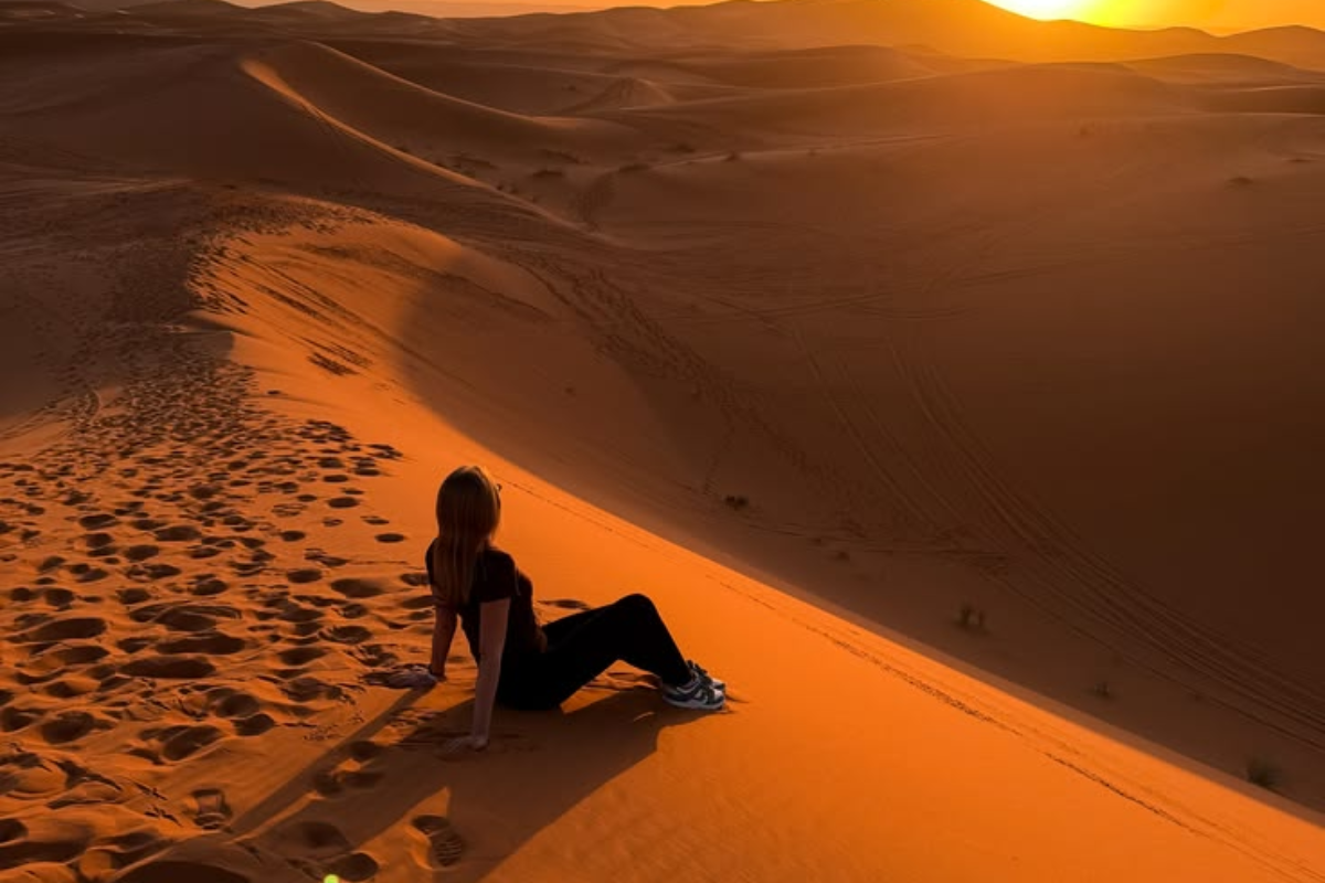 best time quad biking Merzouga desert sunset orange dunes